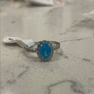 Elegant Silver Ring with Sparkling Blue Stone Size 9